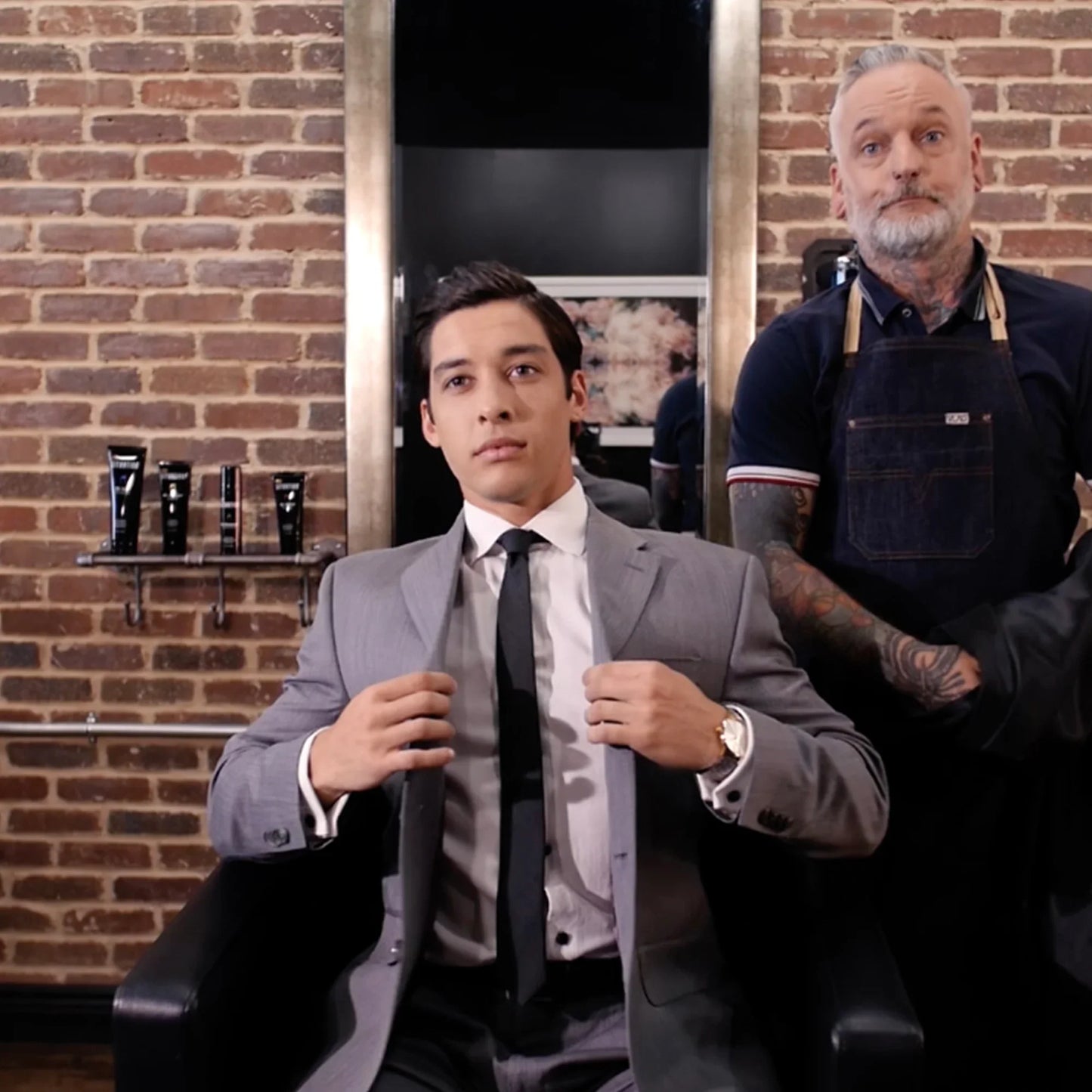 Well-groomed man in a suit at barbershop