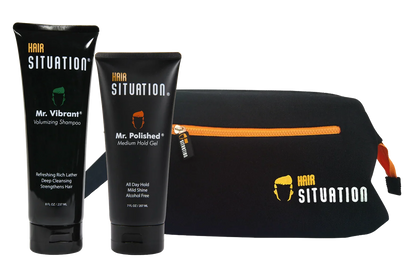 Men’s grooming kit with volumizing shampoo, medium hold gel, and black toiletry bag with orange zipper
